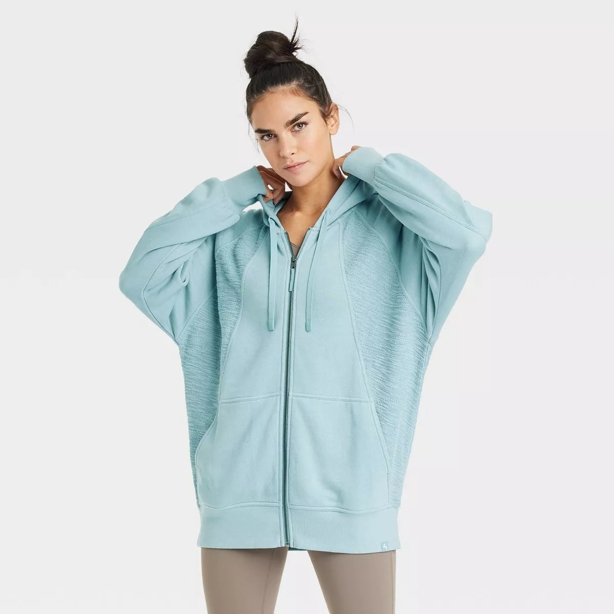 light blue zip up hoodie on model