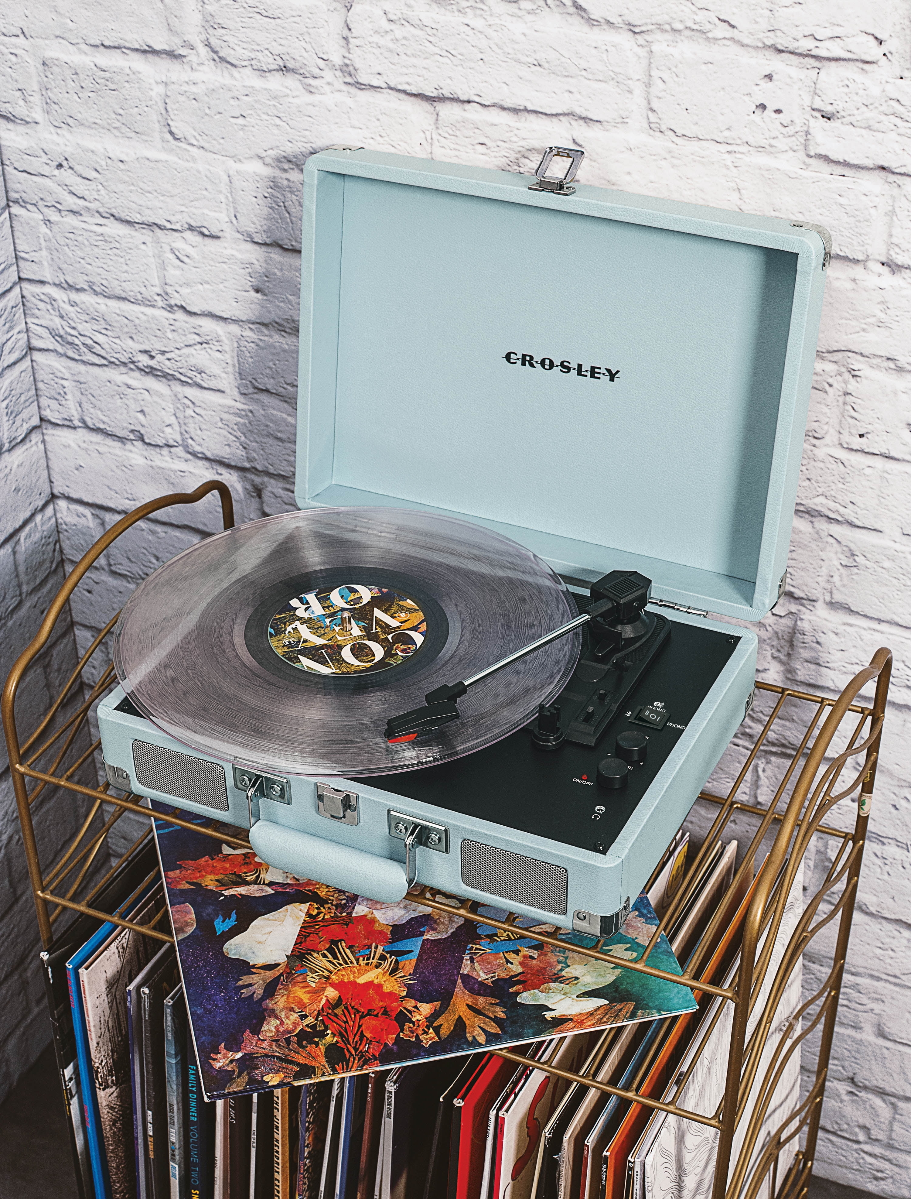 the crosley player with a record on it
