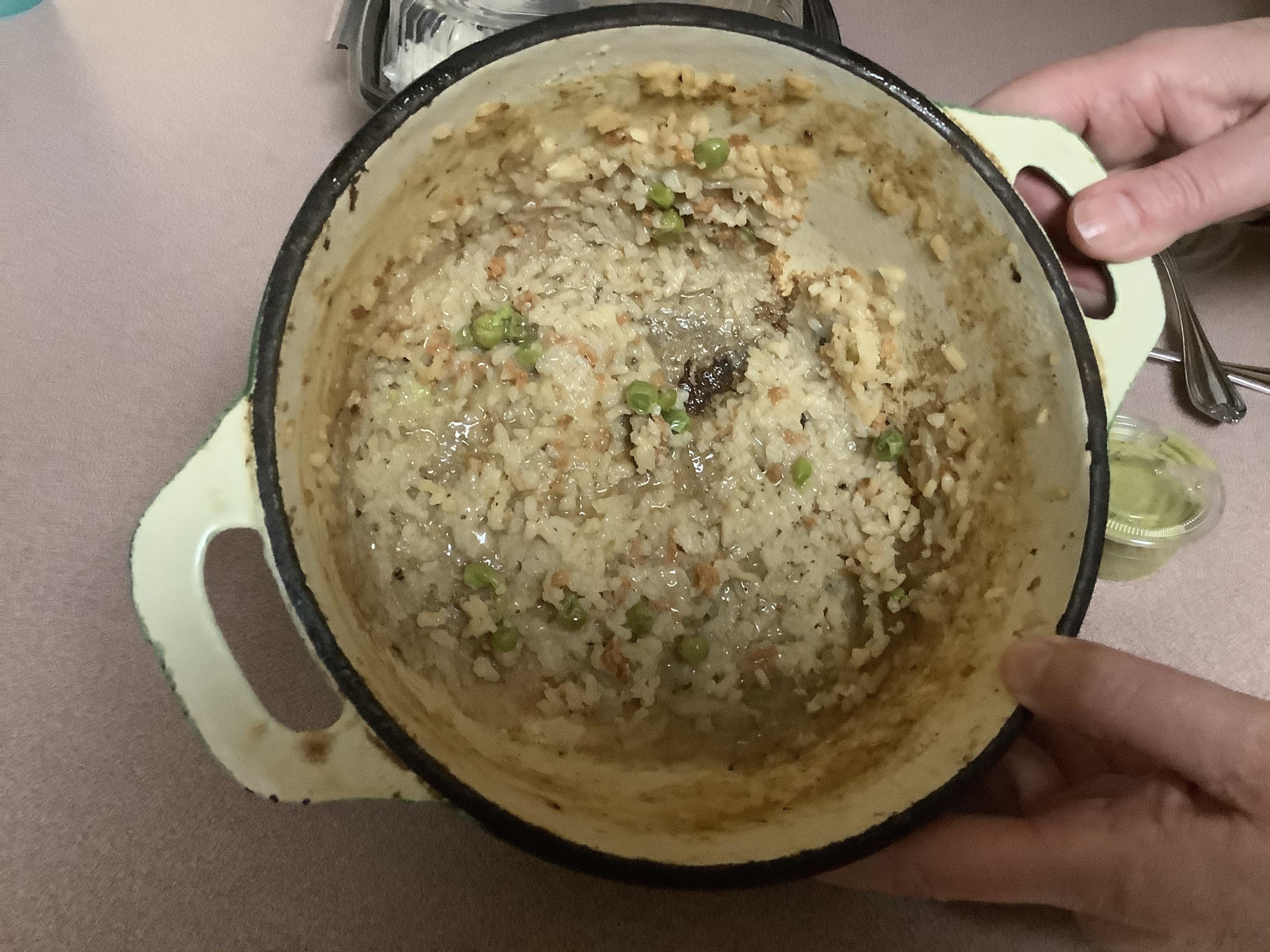 A pot with rice stuck to the bottom.