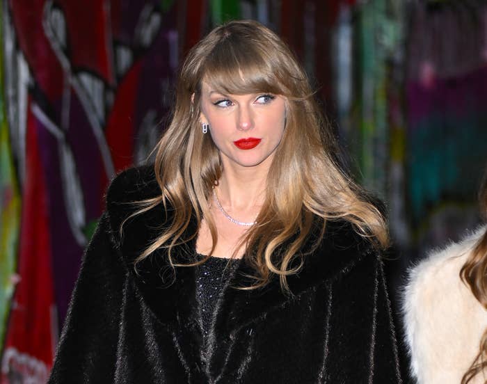 Close-up of Taylor wearing a furry coat