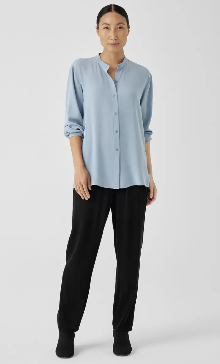 model in the light blue blouse