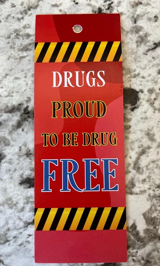 a sign that reads &quot;drugs proud to be drug free&quot;