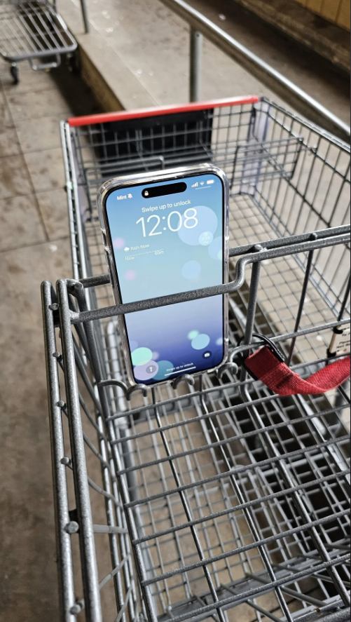 a phone holder on a grocery cart