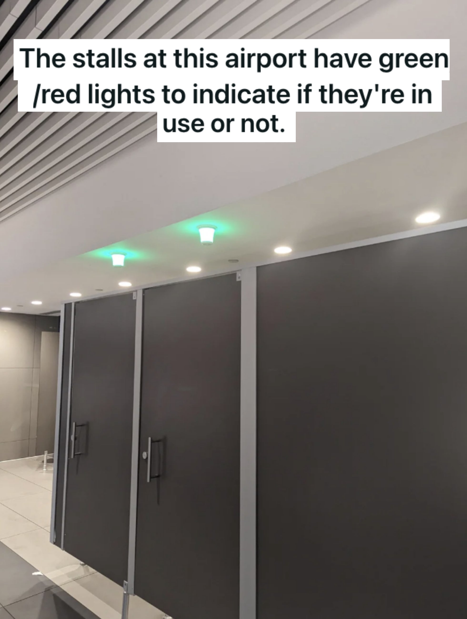green lights over stall doors
