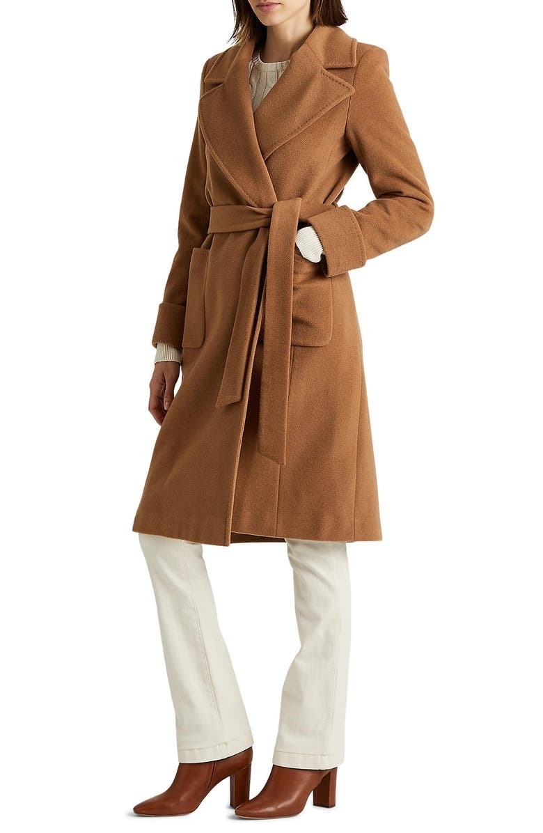 model wearing light brown wrap wool coat