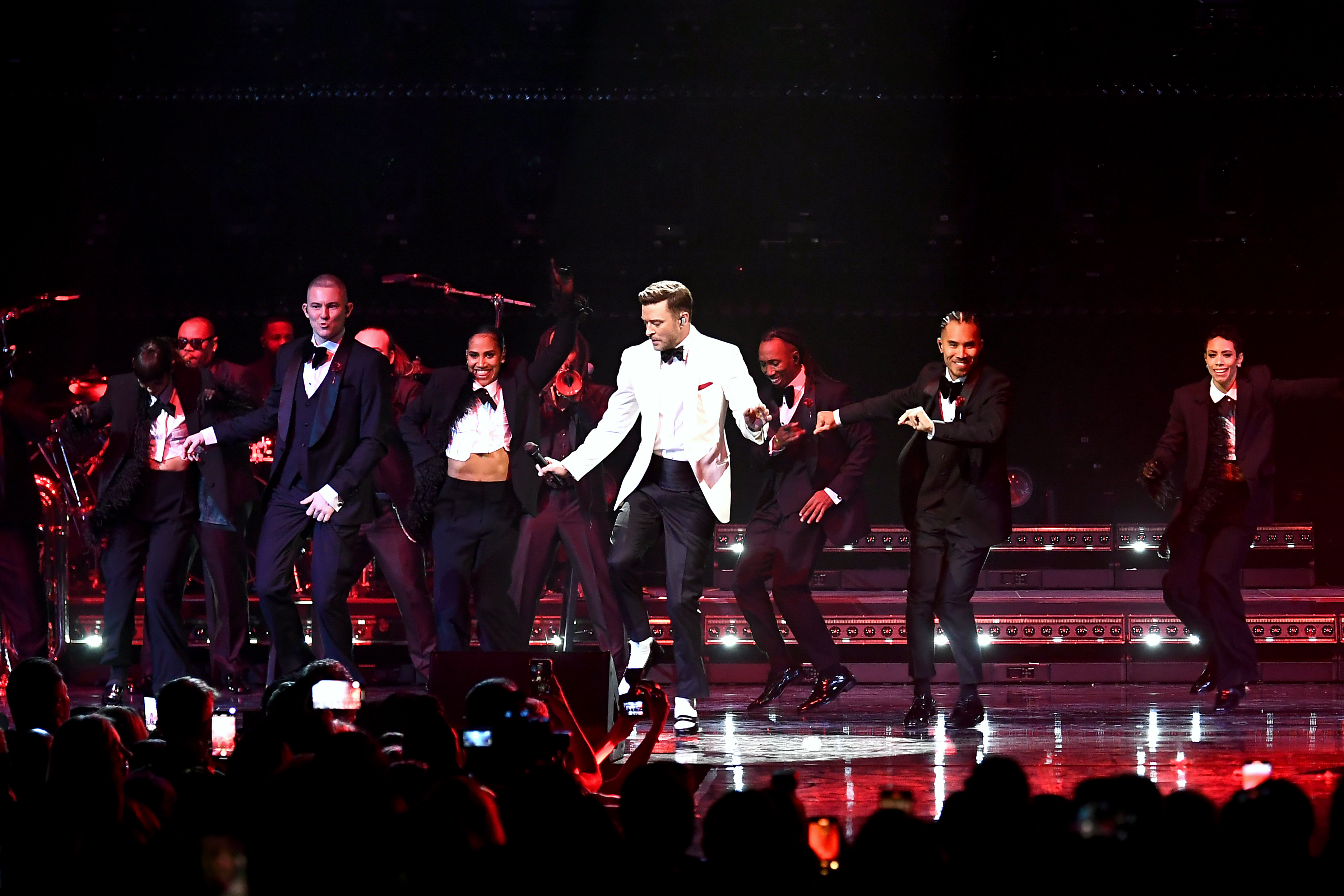 him on stage with dancers