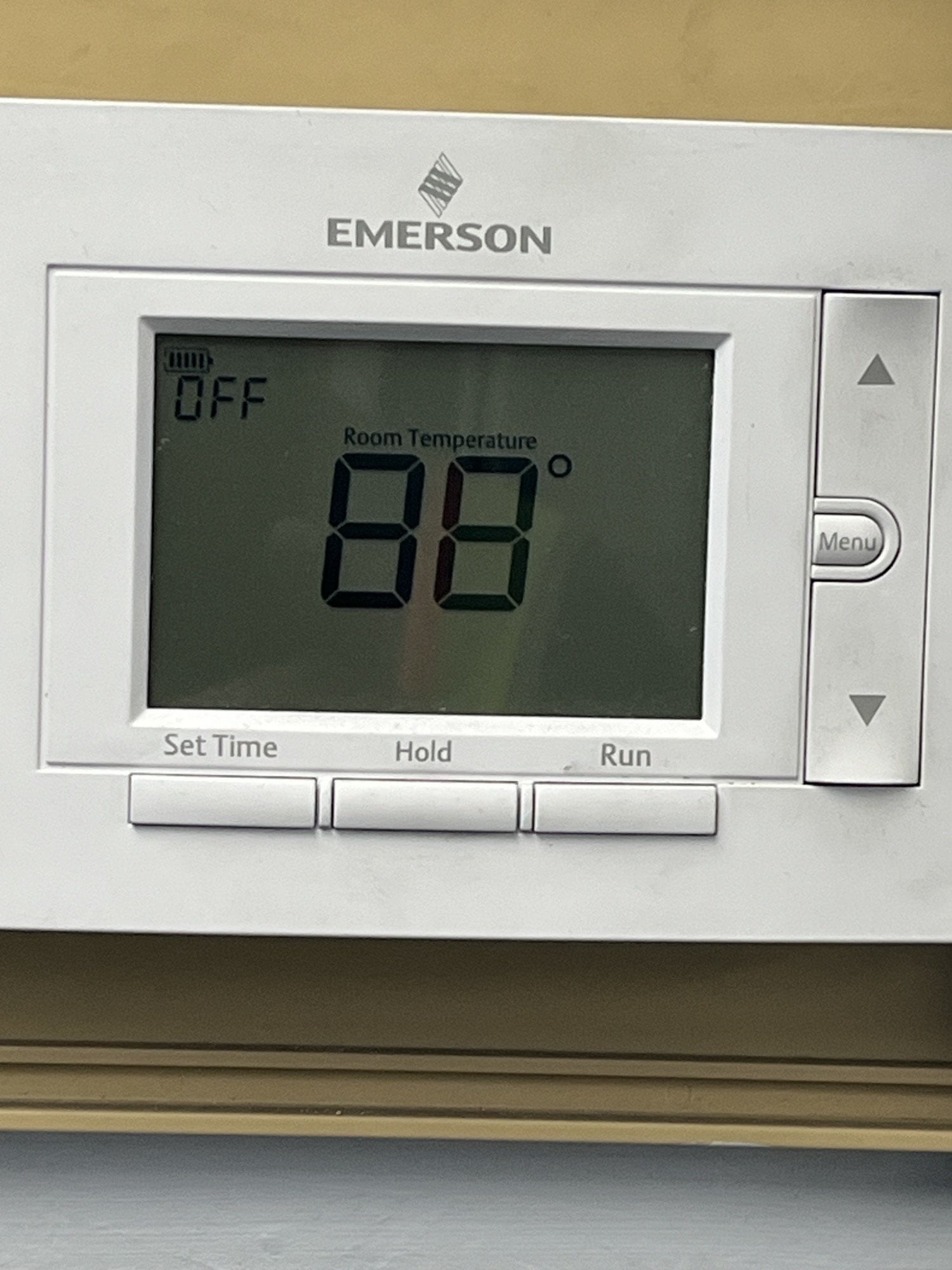 The thermostat says 88 degrees