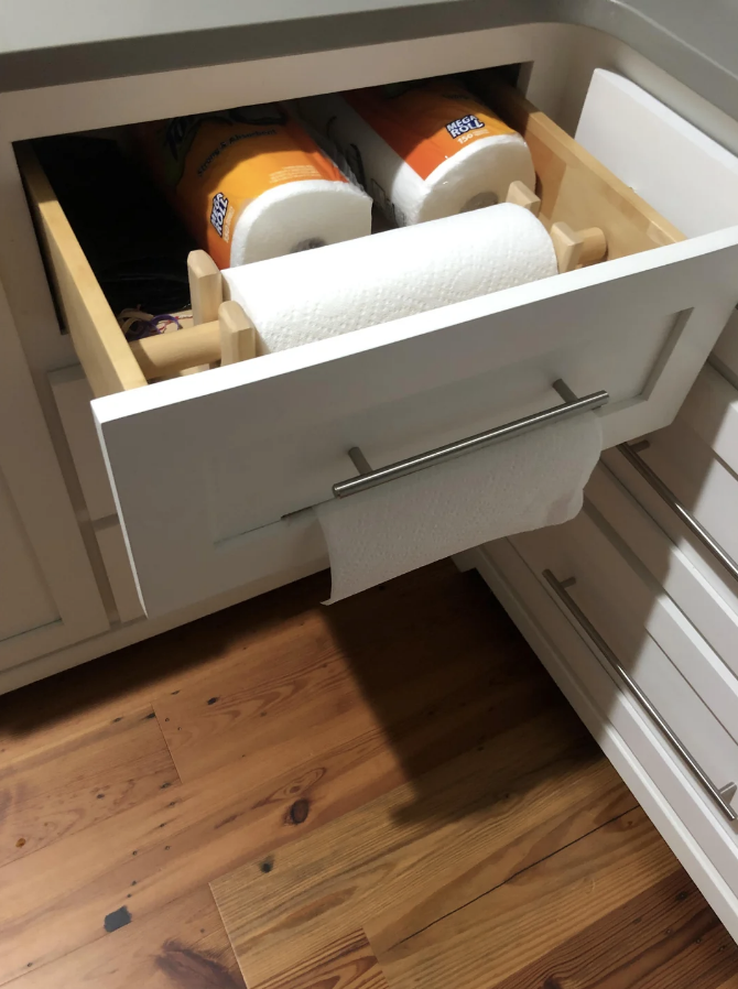 a paper towel dispenser in a drawer