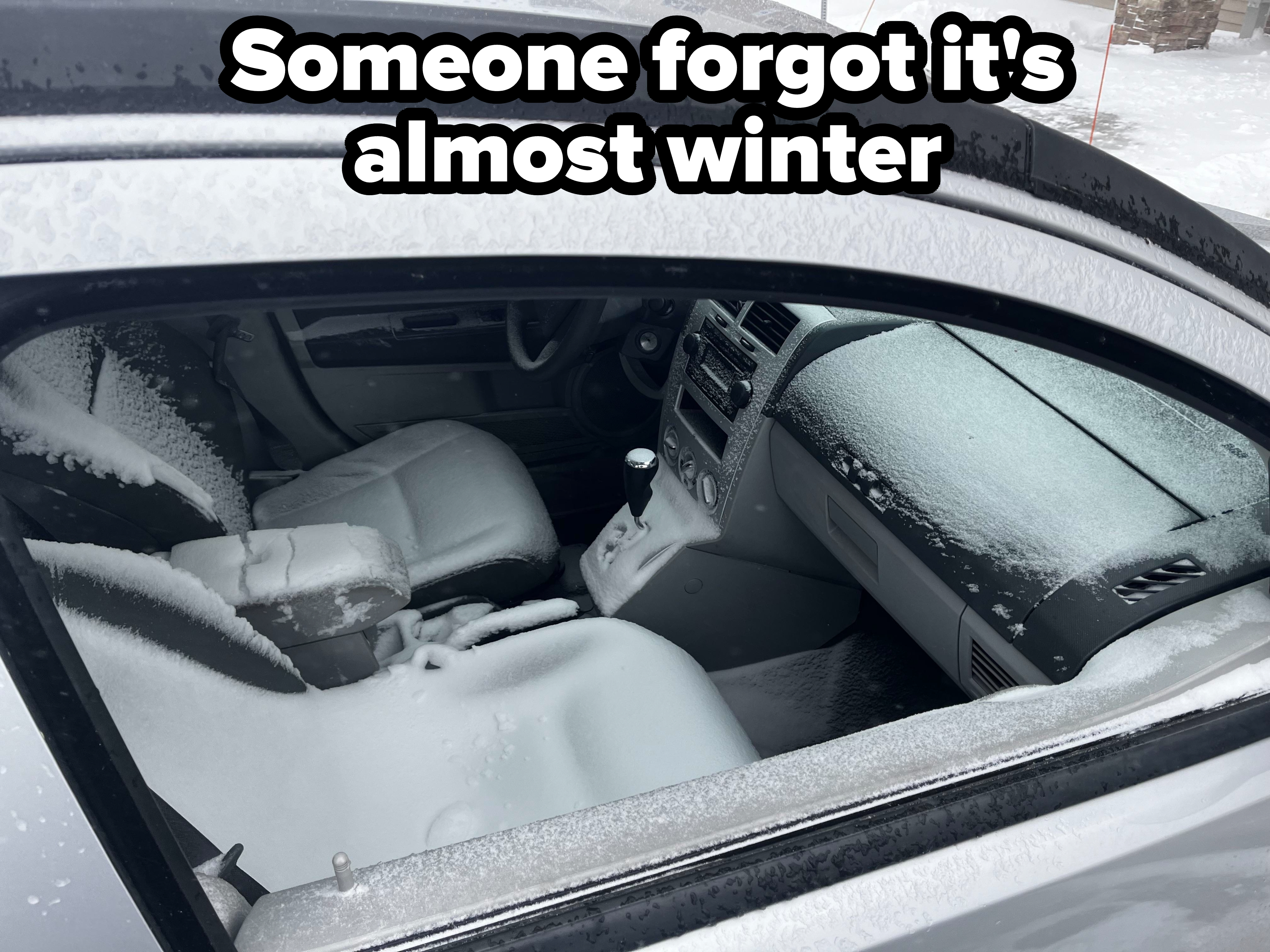 snow all over the interior of a car