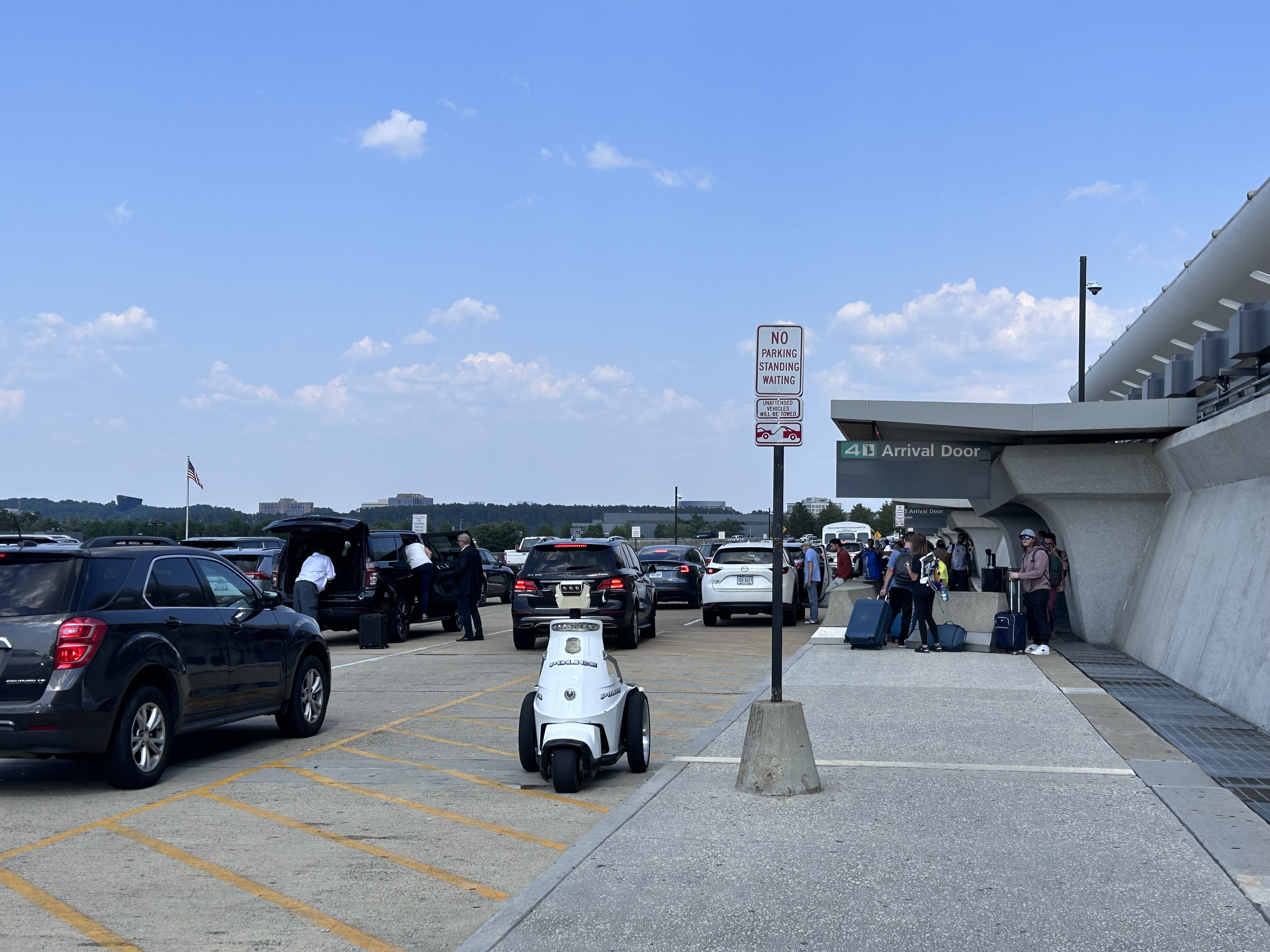 cars lining up outside Dulles Airport
