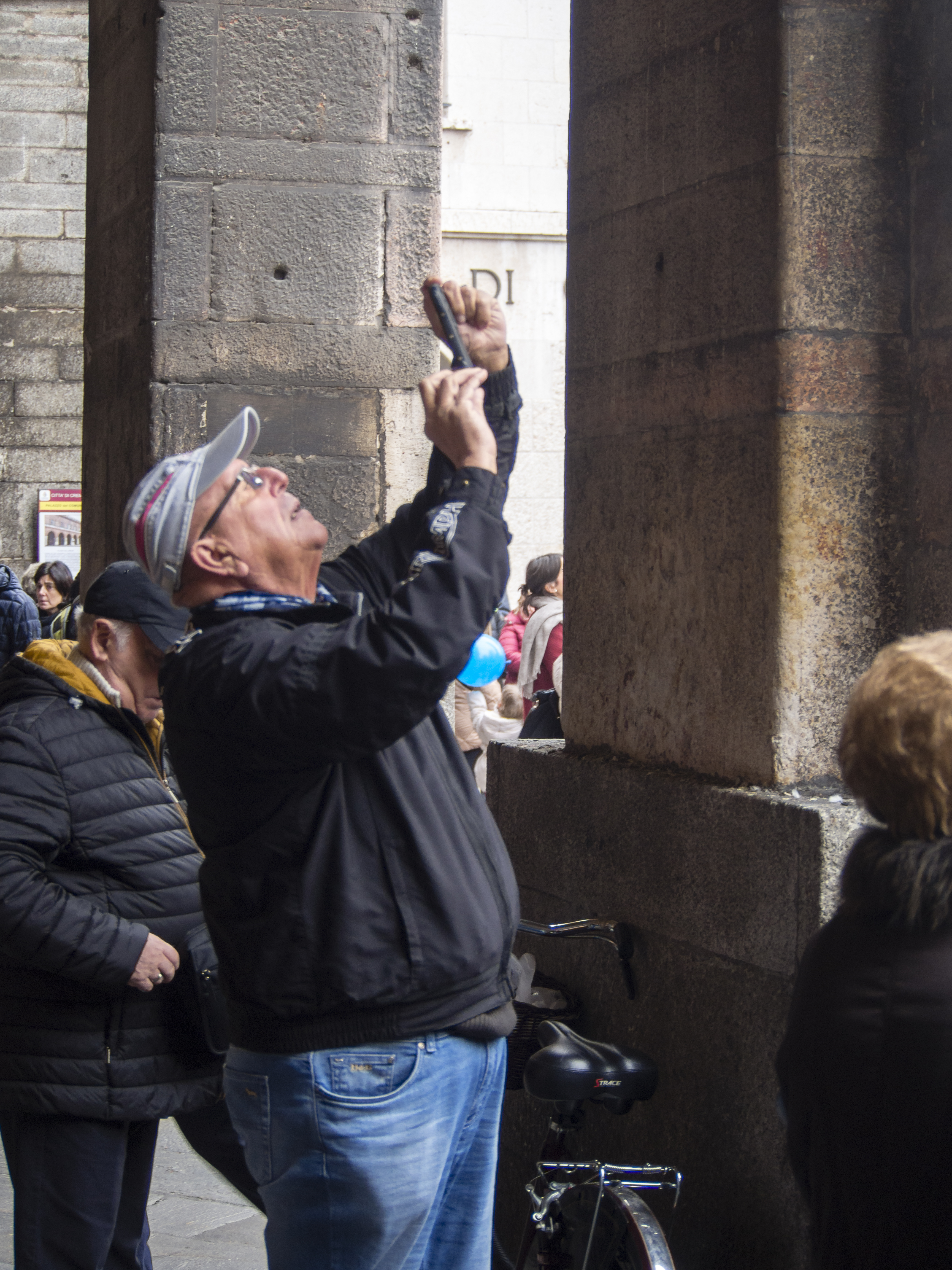 a man taking a photo on his phone