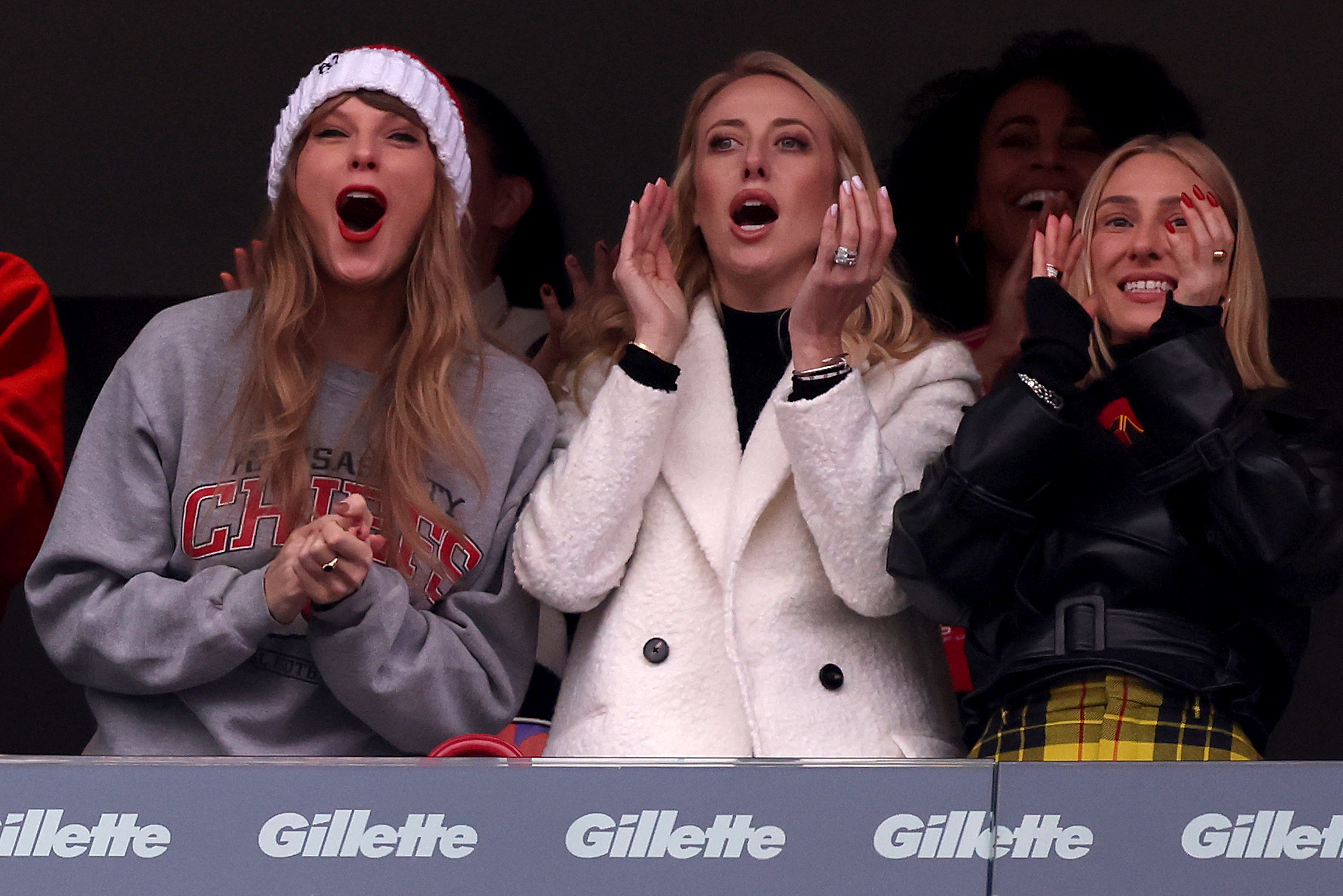Close-up of Taylor with friends at a game