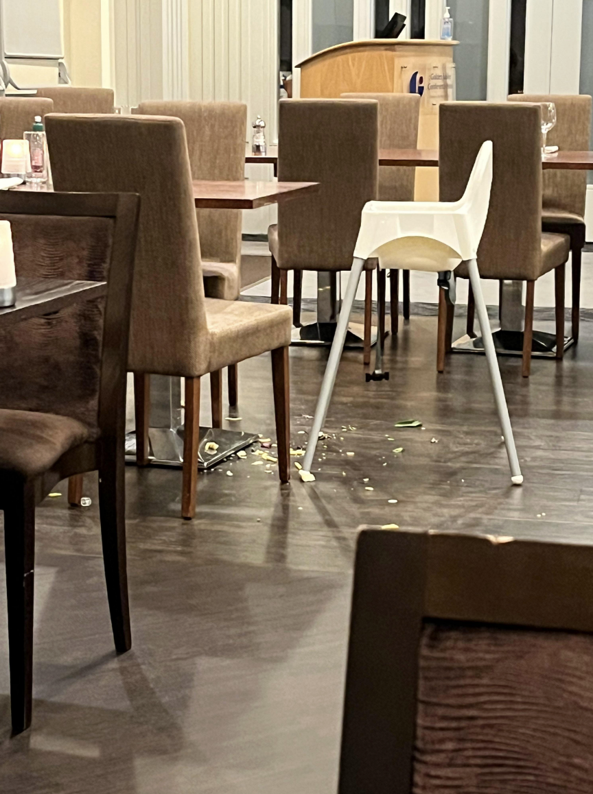 Food all over the floor in a restaurant