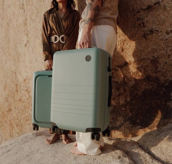 green hard shell carry-on suitcase