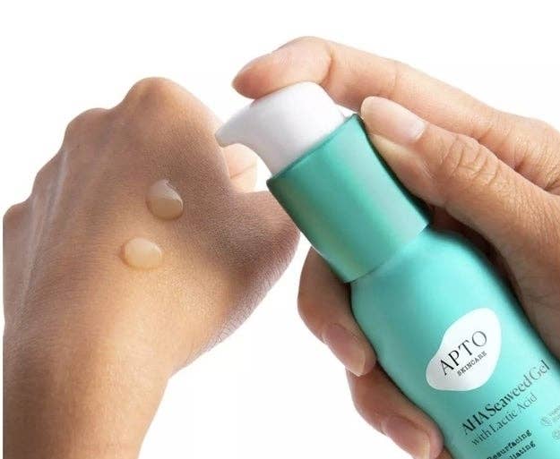 model pumping product onto hand