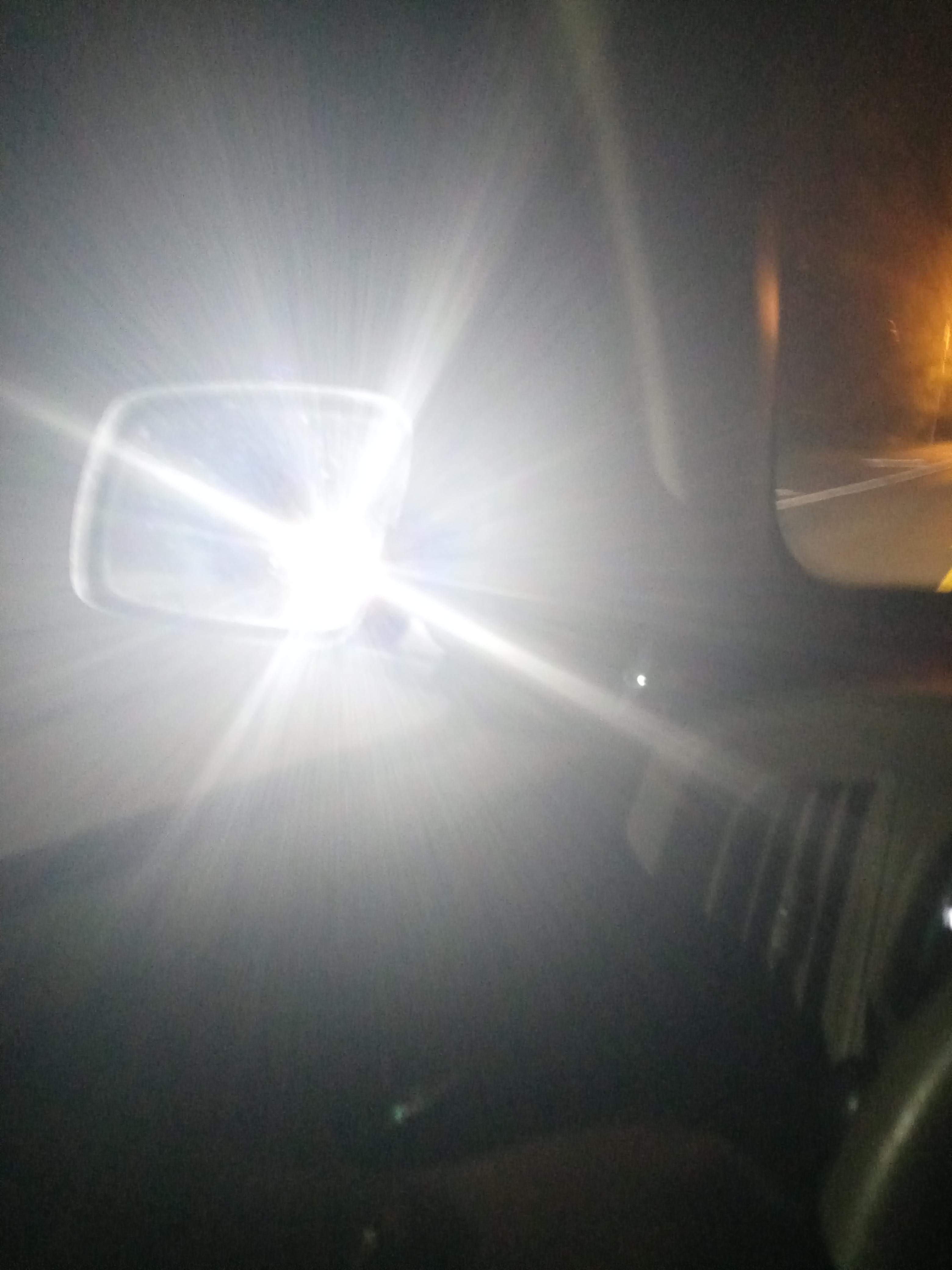 High beams on in someone&#x27;s rearview mirror
