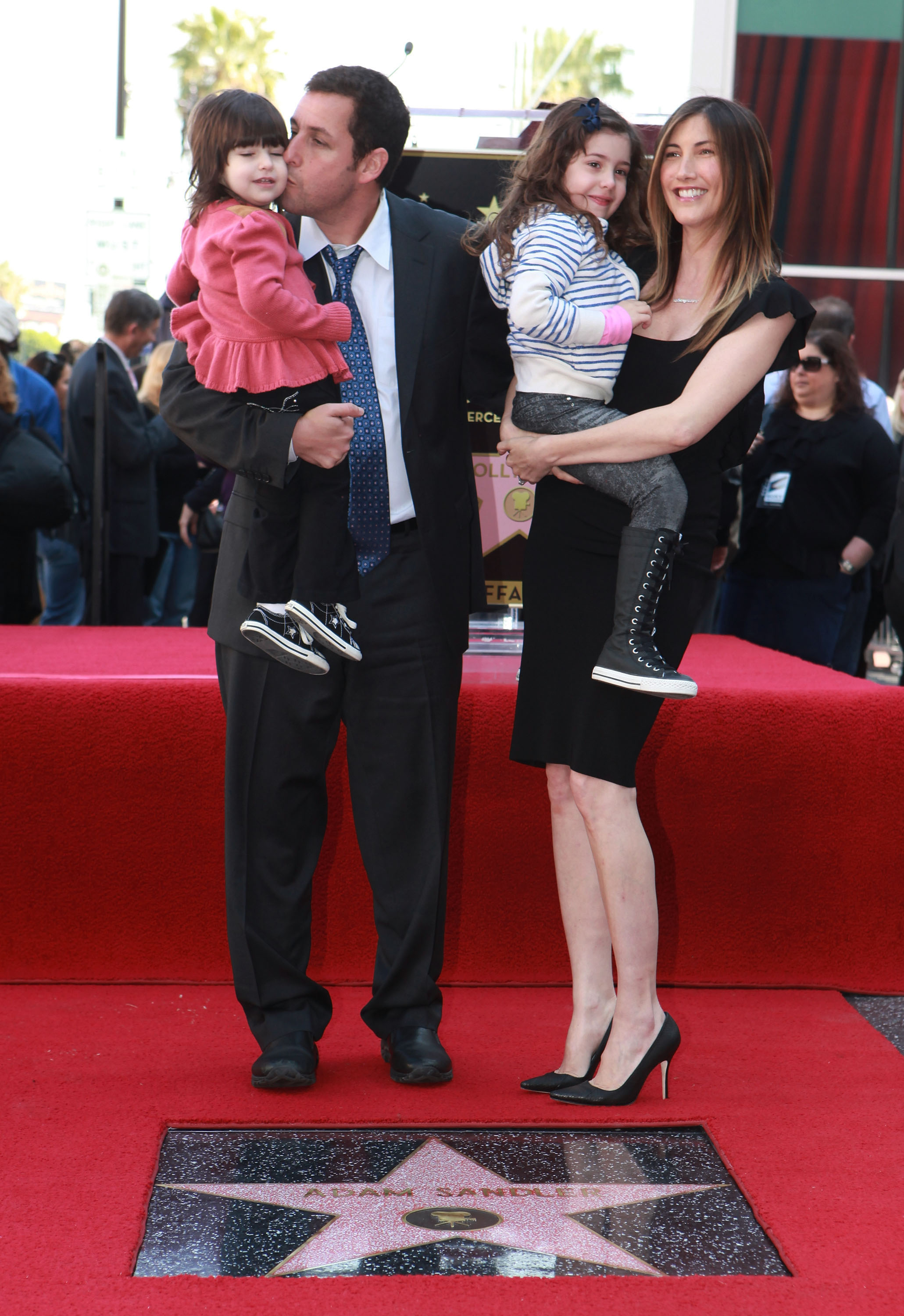 Adam and Jackie Sandler with their daughters, Sadie and Sunny