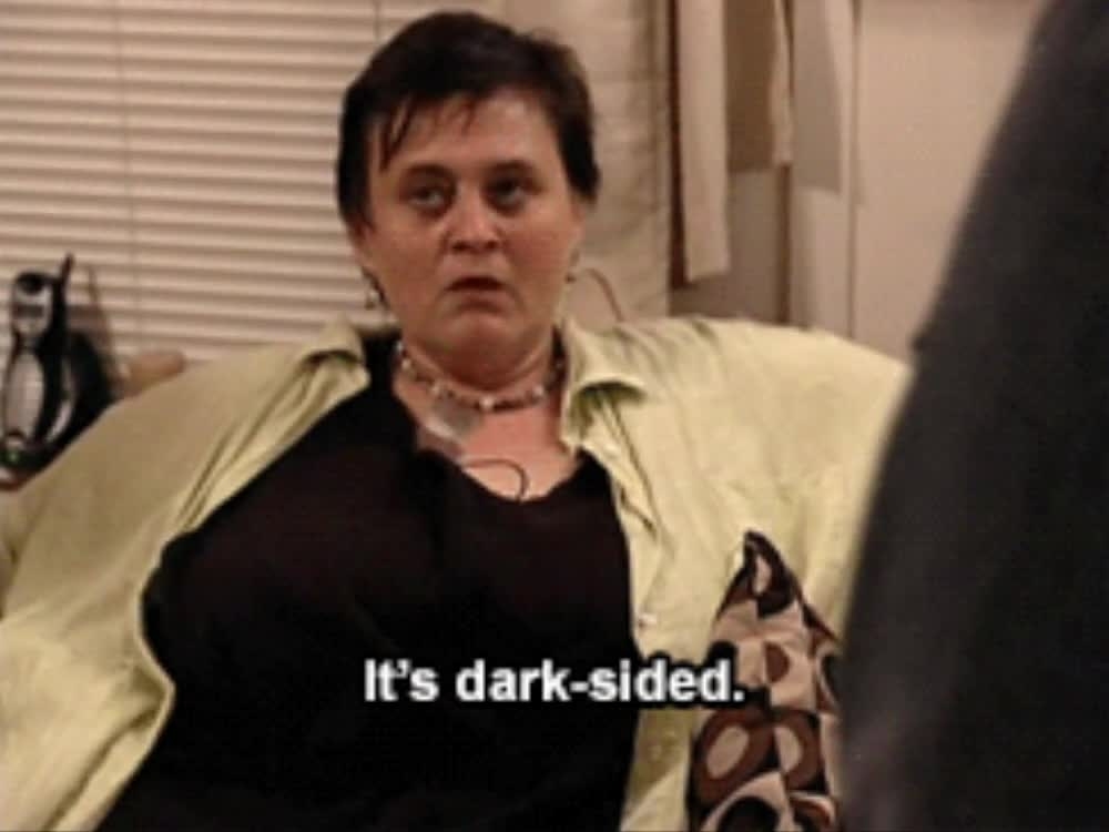 Woman looking disgusted and saying &quot;It&#x27;s dark-sided&quot;
