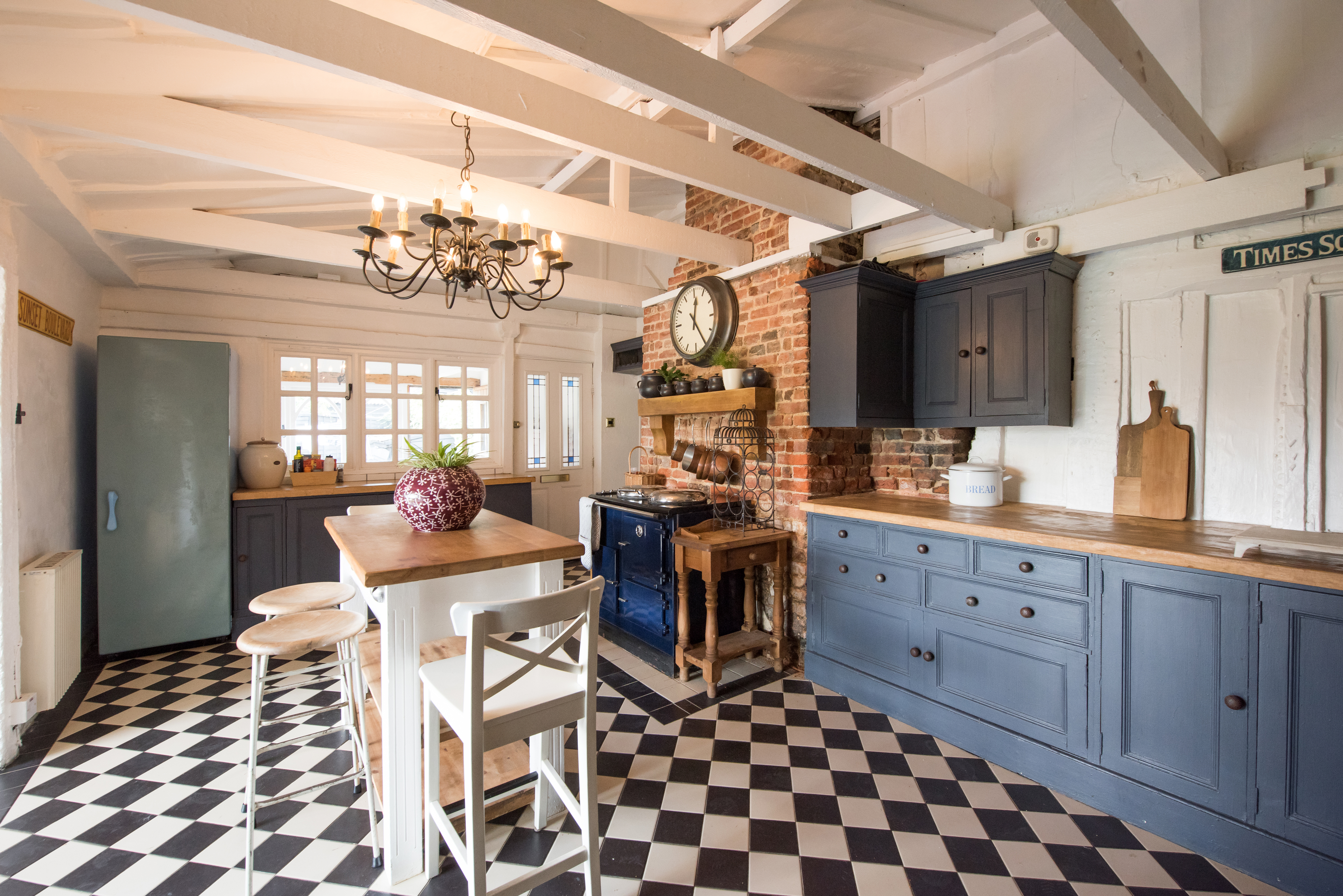 vintage style kitchen with checkerboard tile floor