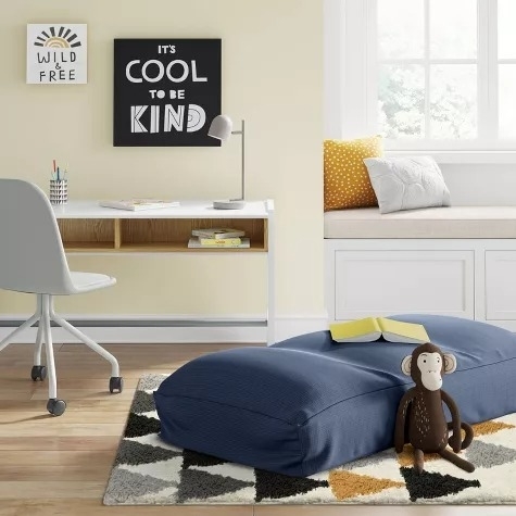 a navy crash pad in a kids room