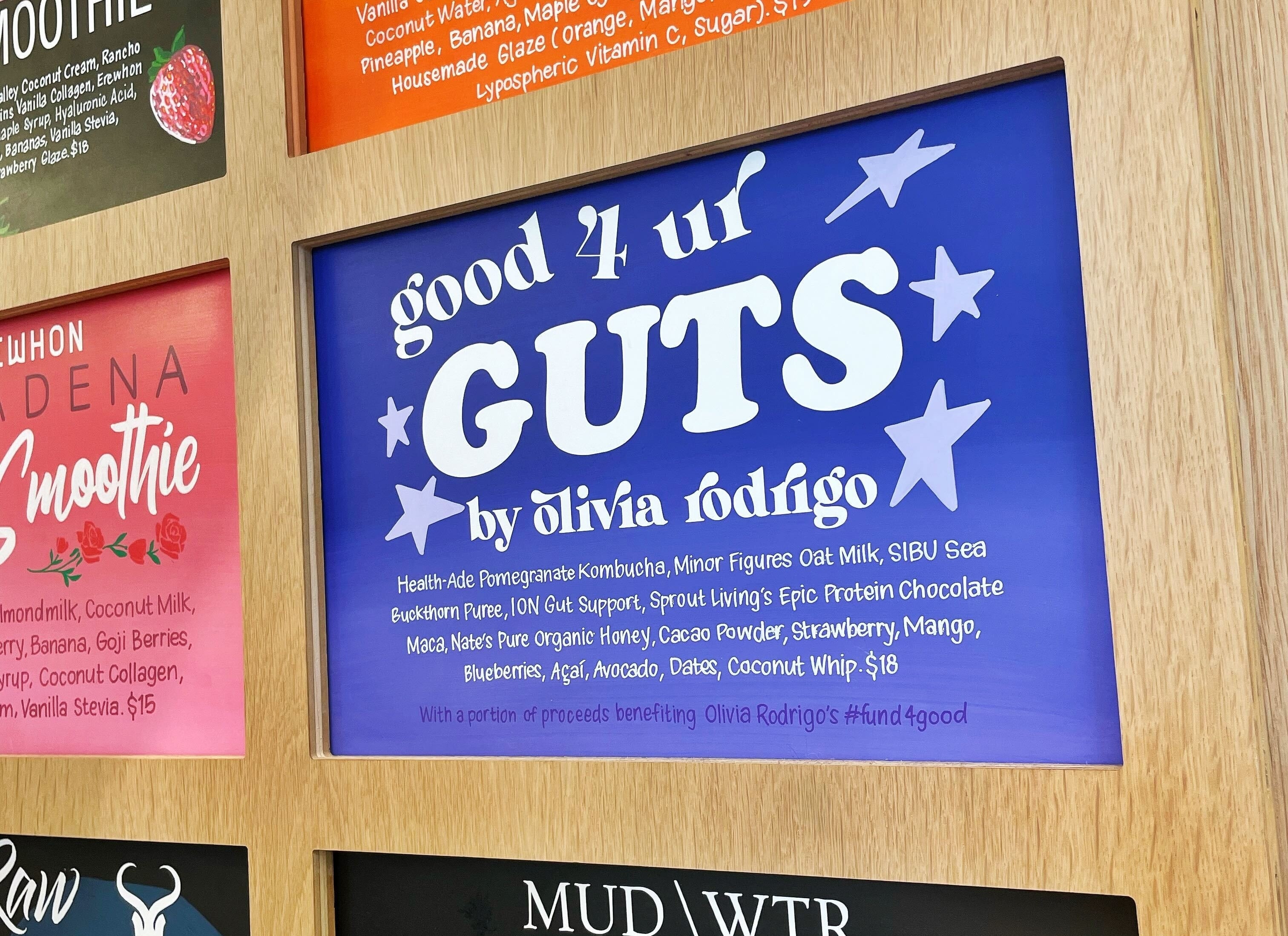 The menu board for Olivia Rodrigo&#x27;s &quot;Good 4 ur GUTS&quot; smoothie is shown