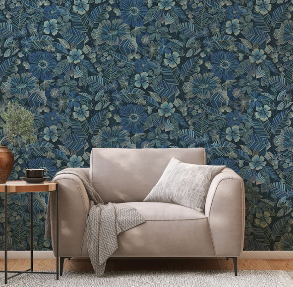 dark navy floral wallpaper behind accent chair