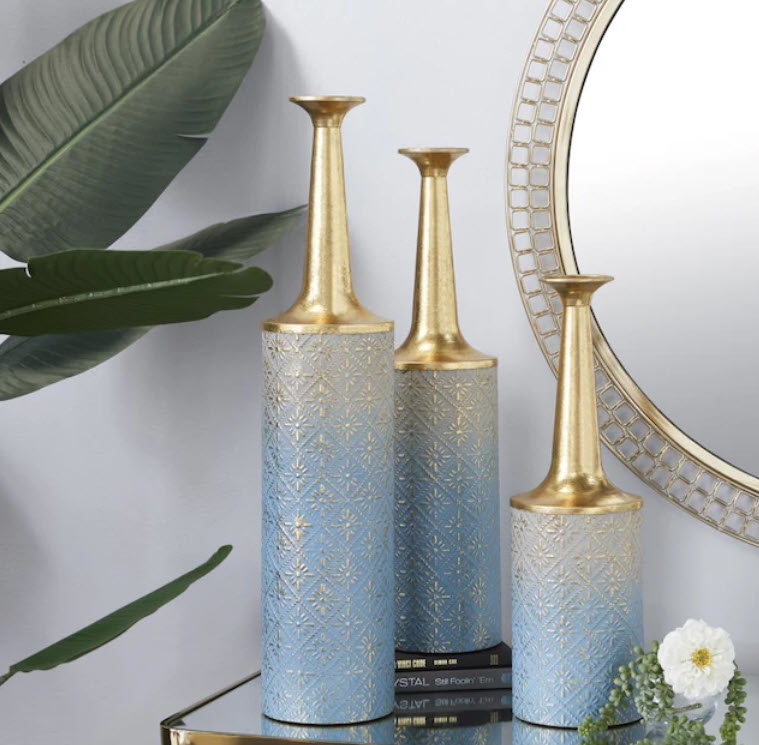 set of three various-sized vases in an ombre gold finish