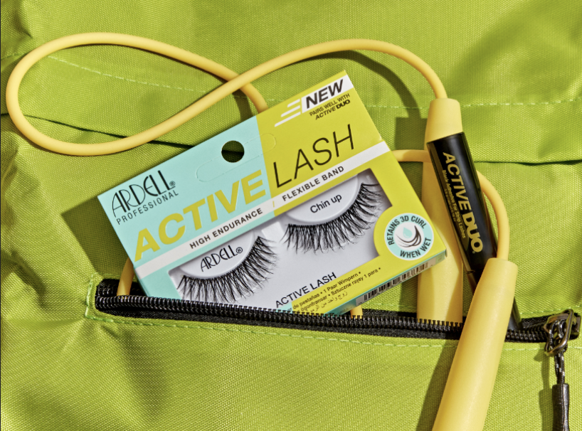 A pair of lashes in a green gym bag.
