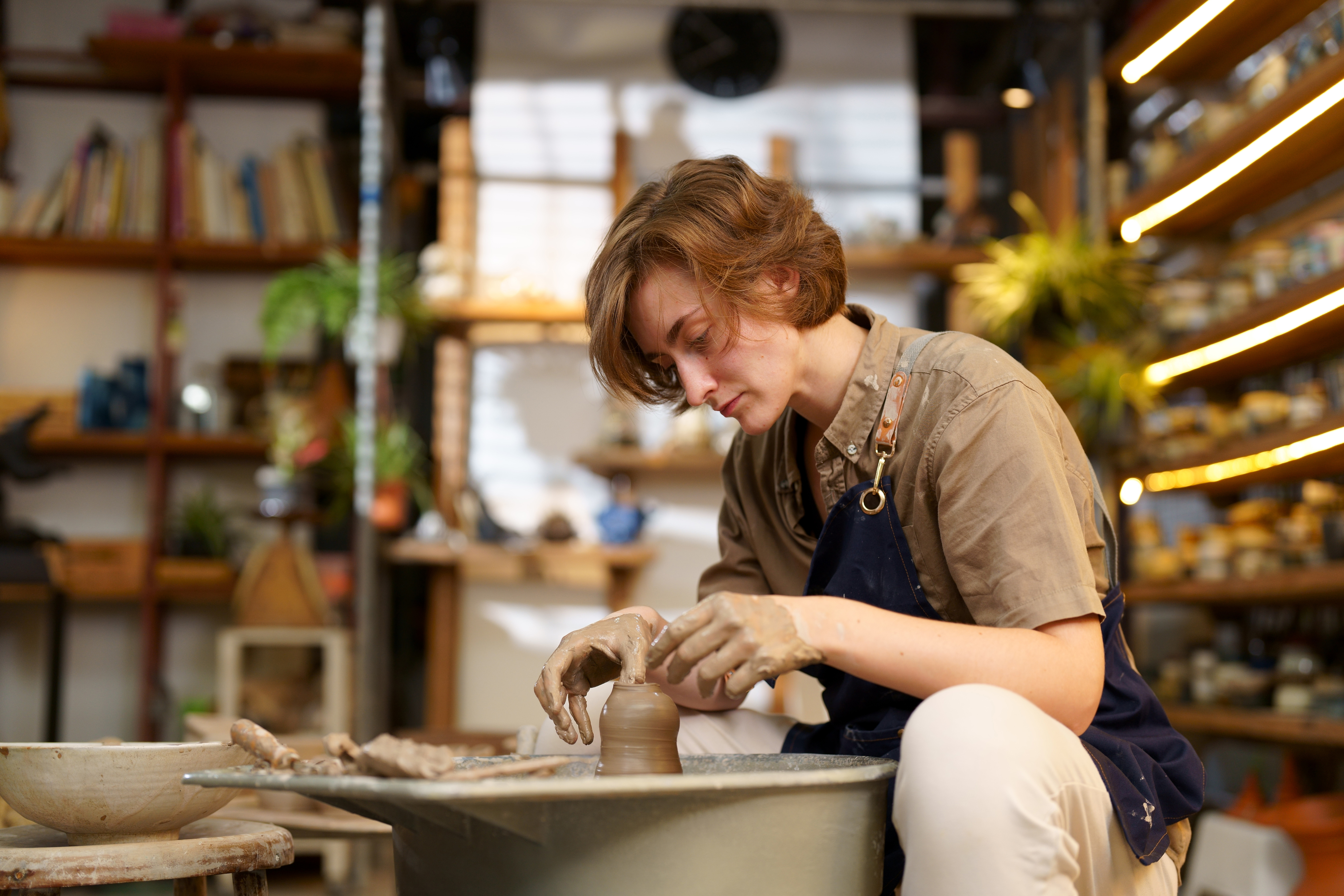 a person doing pottery