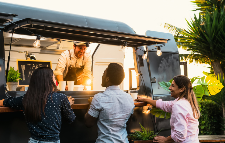 People ordering from a food truck