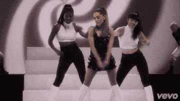 ariana grande with 2 background dancers