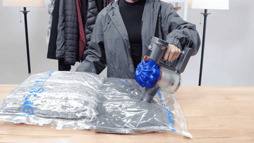 a gif demonstrating how air is sucked out of the bags using a vacuum