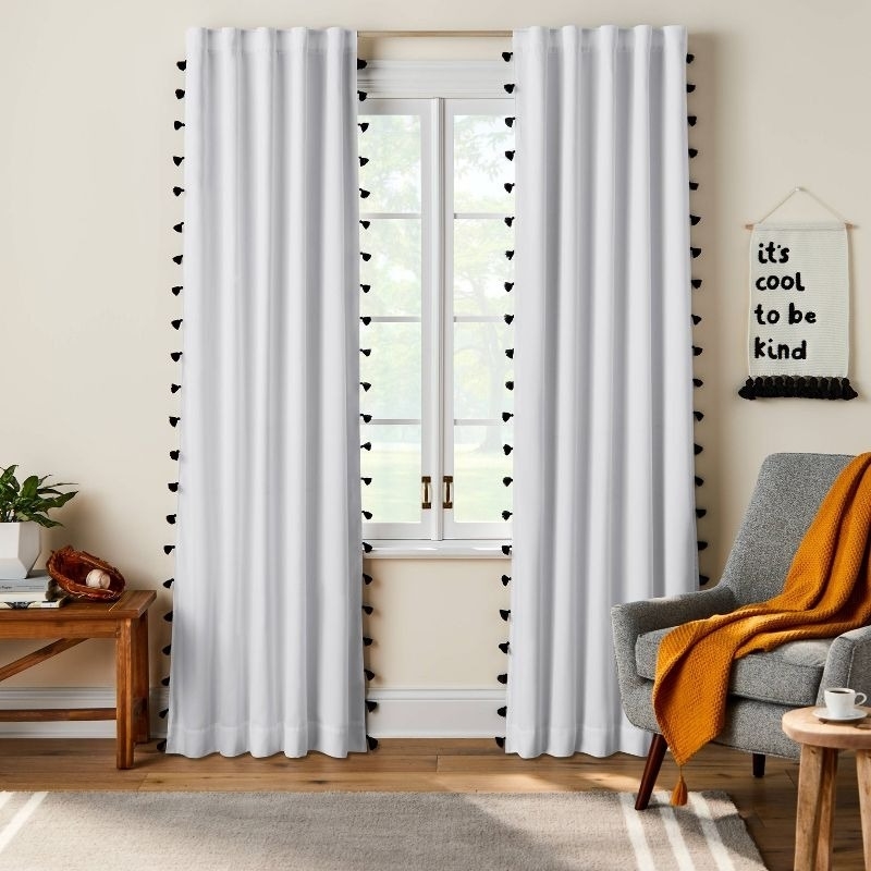white curtains cover a window