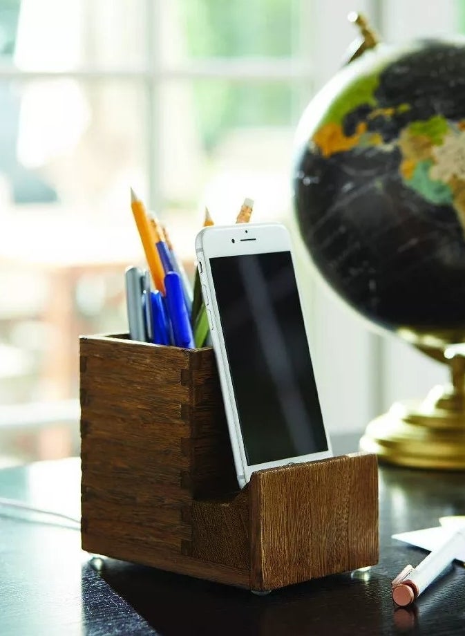 the pencil and phone holder