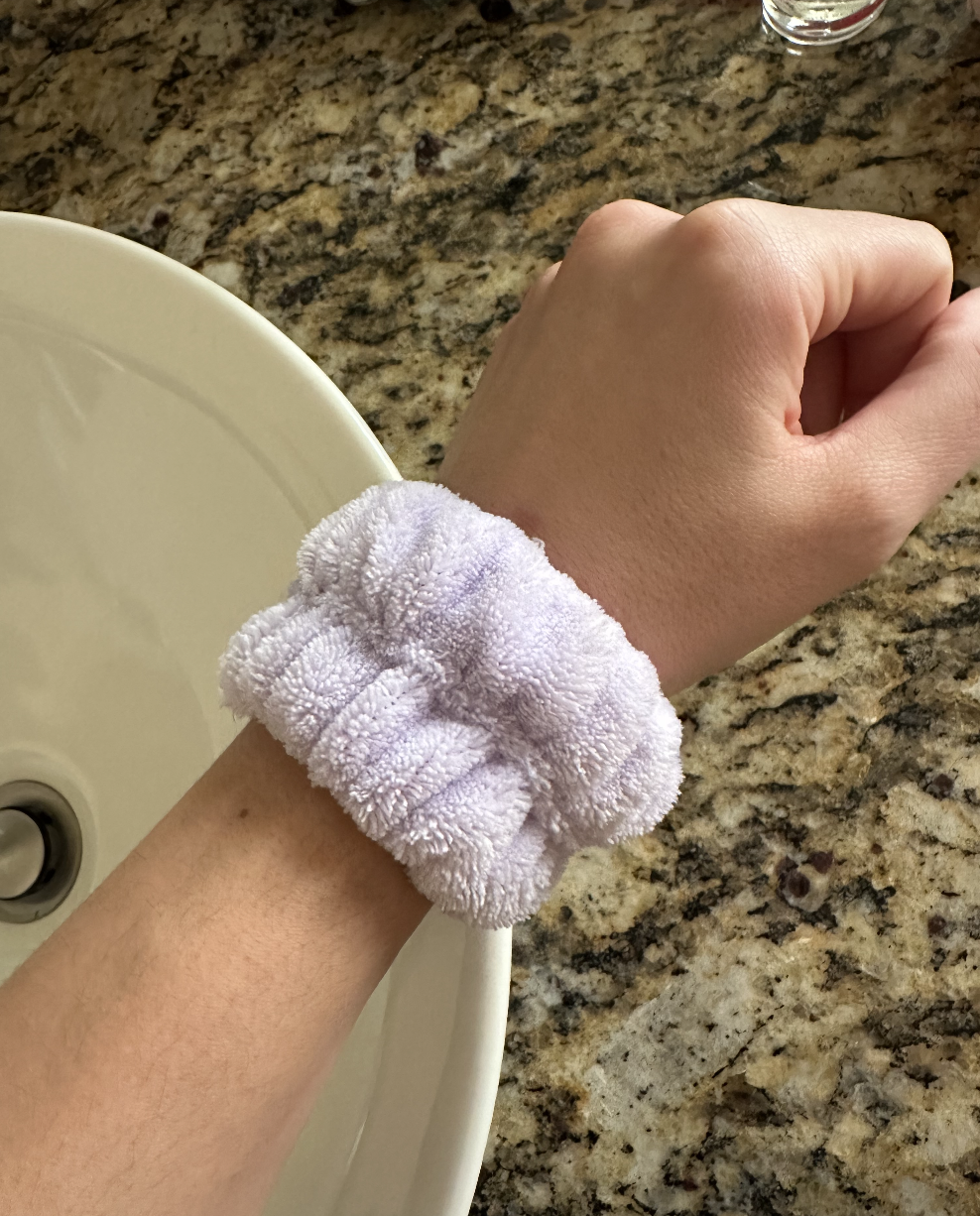 The author wearing a wrist towel