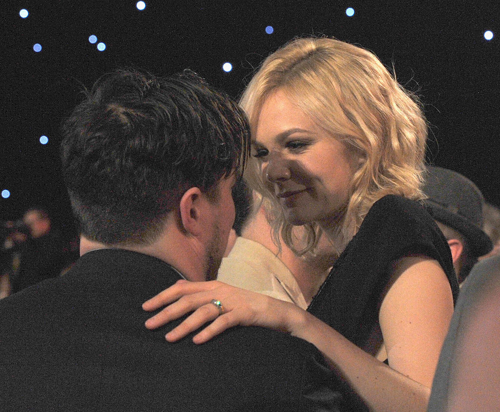 Closeup of Marcus and Carey hugging