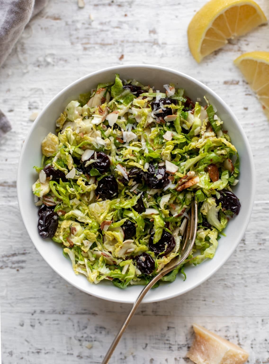 brussel sprouts slaw in a serving bowl