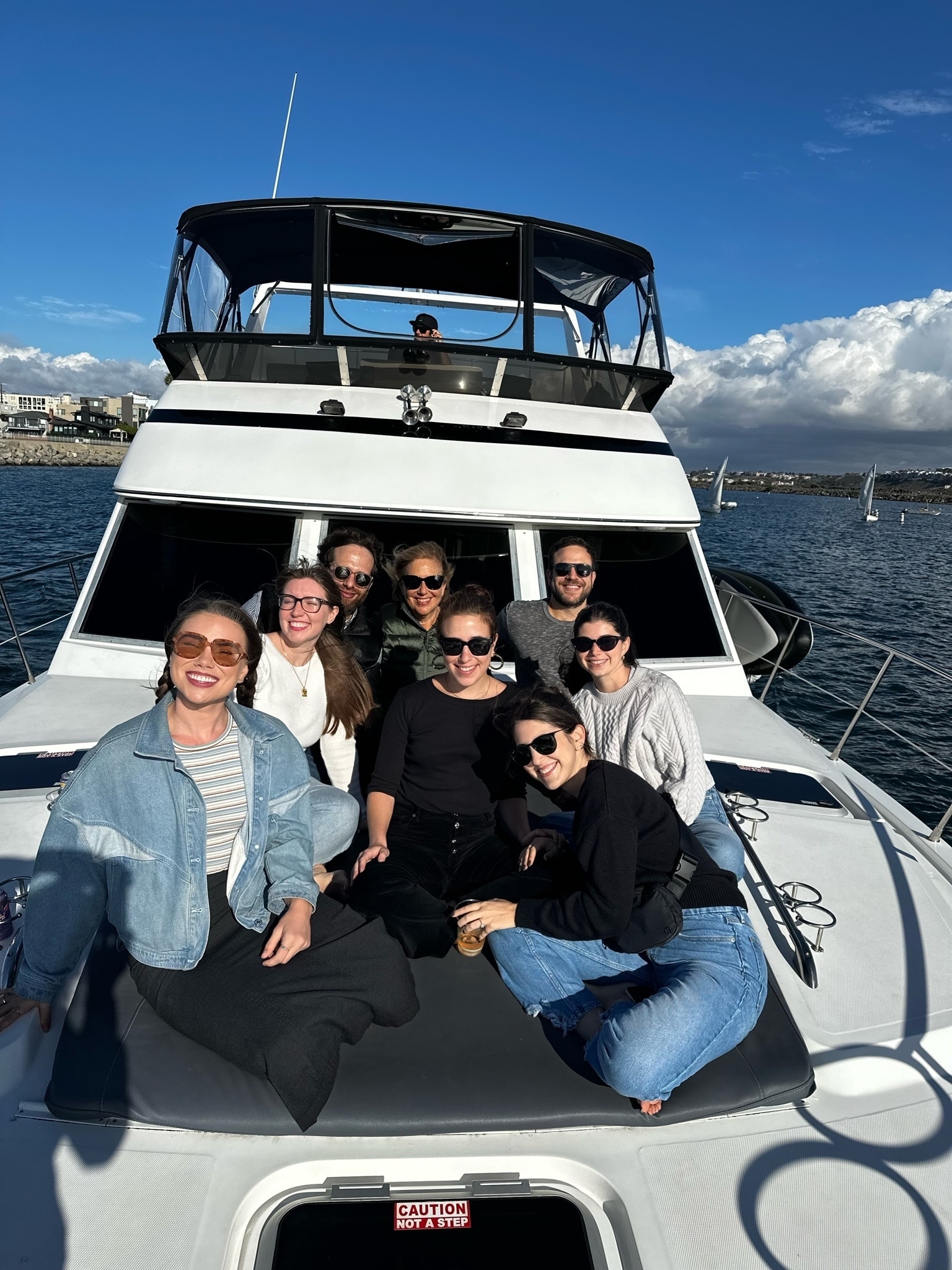 The author and her friends and family on the boat