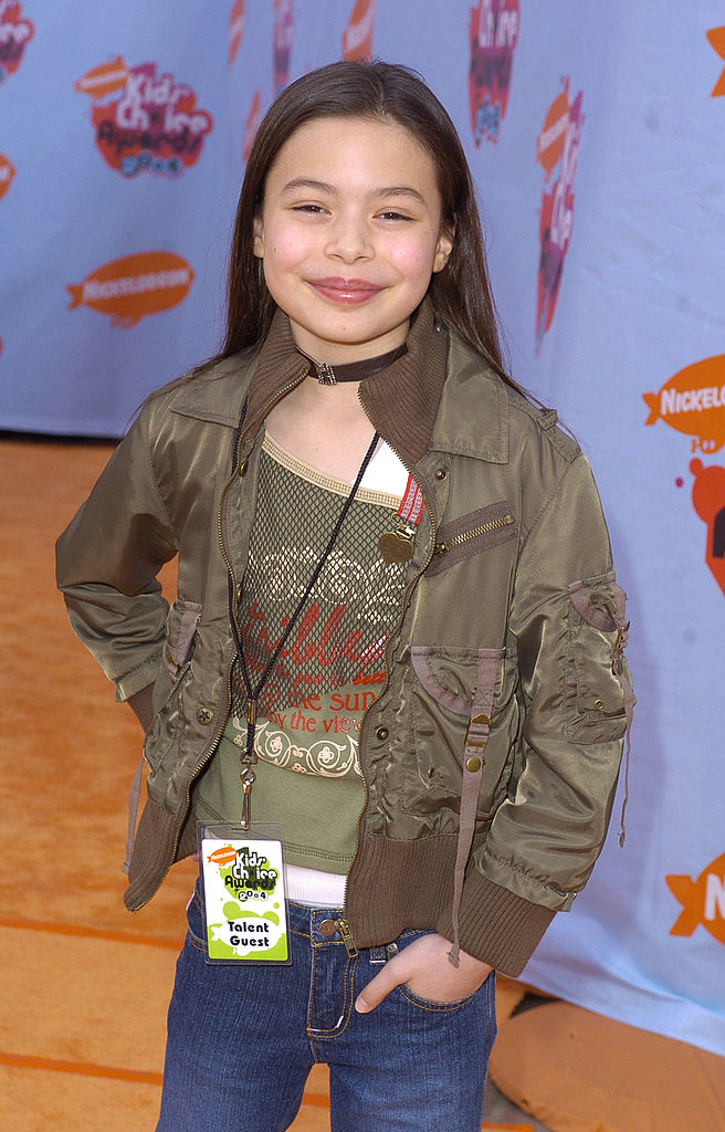 closeup of her in jeans and a jacket for a nickelodeon event