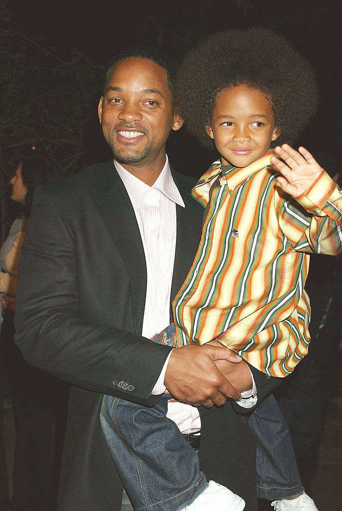 he&#x27;s being carried by his dad will smith at an event