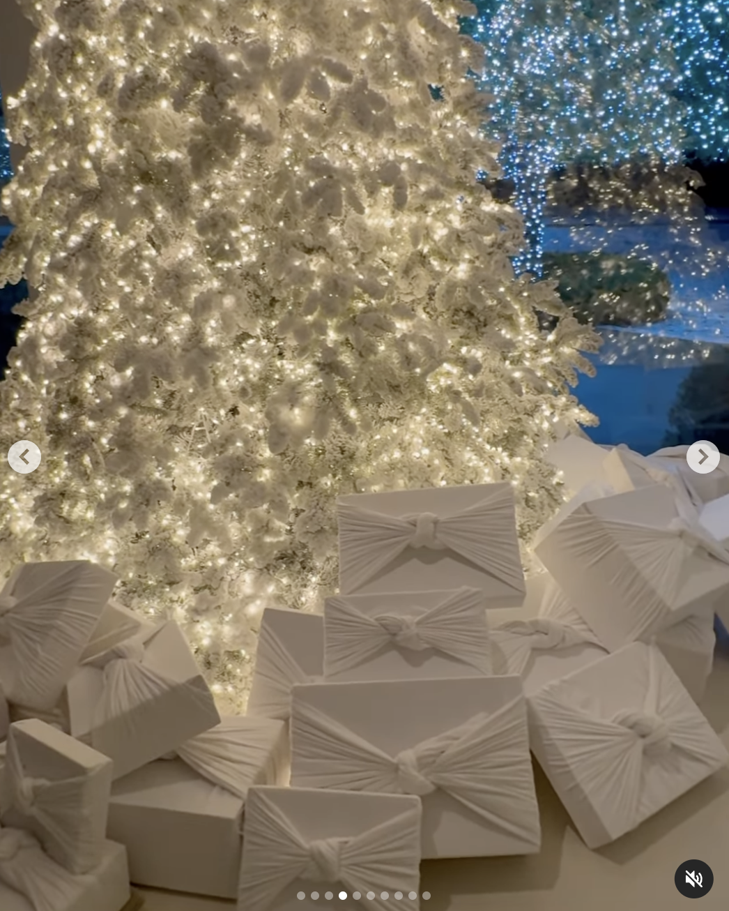Presents under the tree and wrapped in white cotton fabric