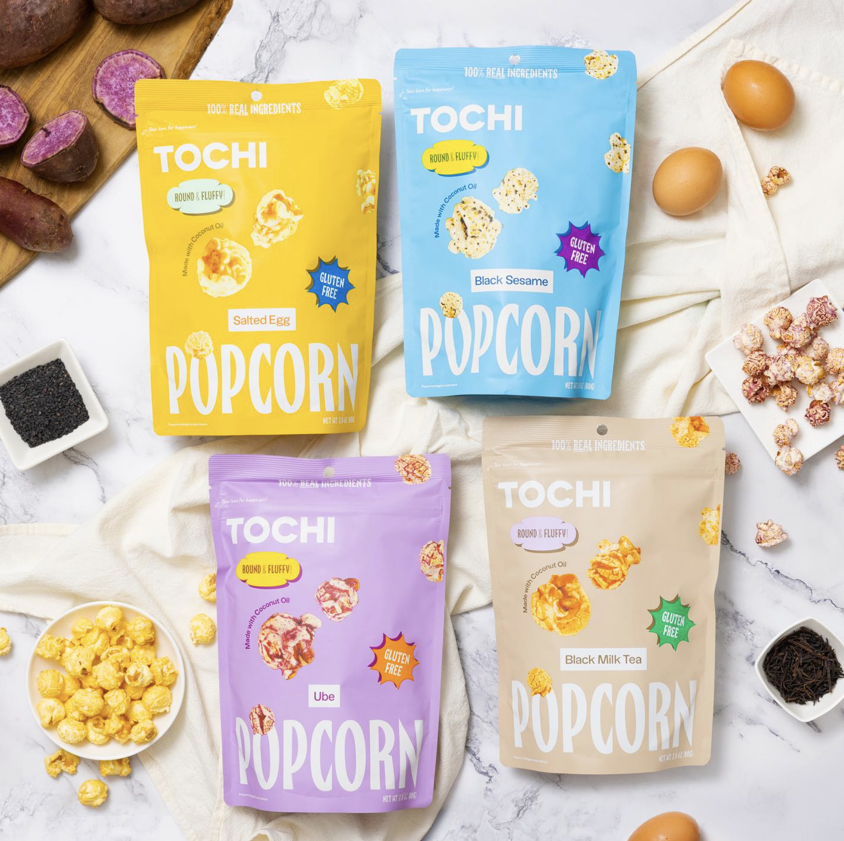 Tochi Popcorn surrounded by ingredients and the popcorn