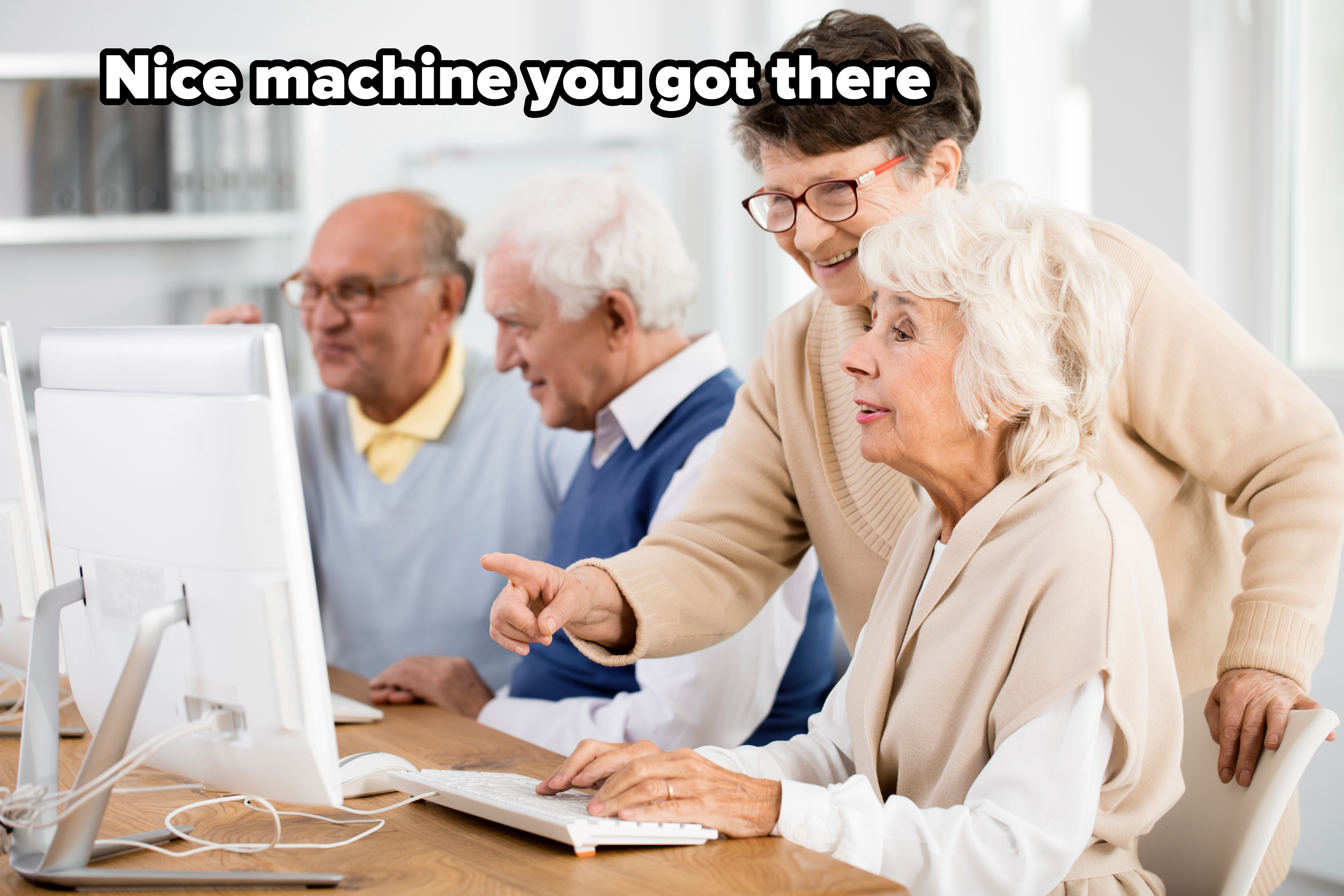 Older people at a computer with caption, &quot;Nice machine you got there&quot;