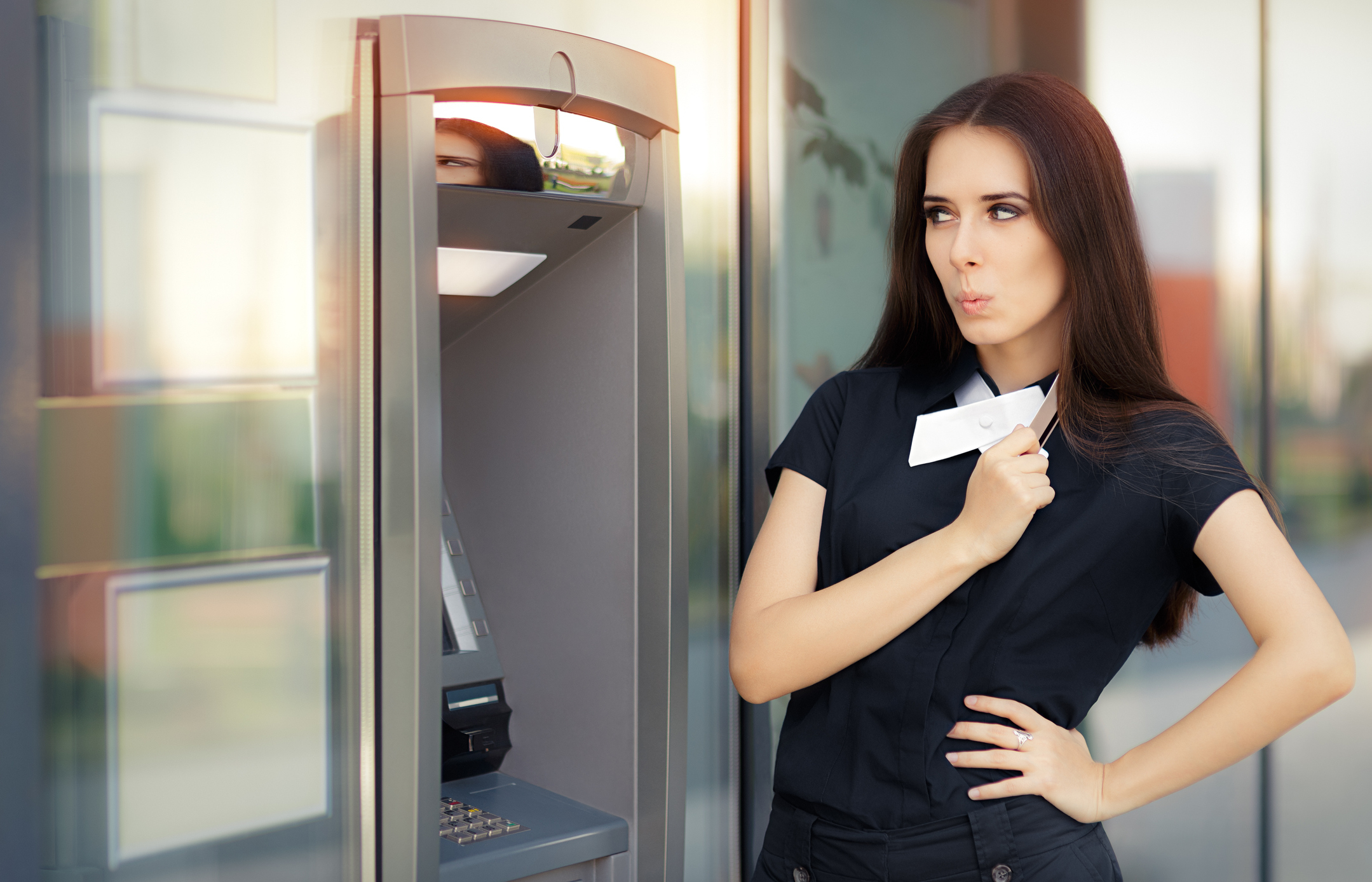 A woman at an ATM