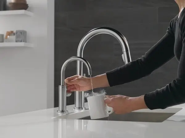 Pouring hot water into a mug
