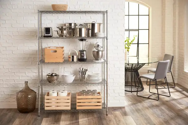 A shelf with kitchen gadgets on it