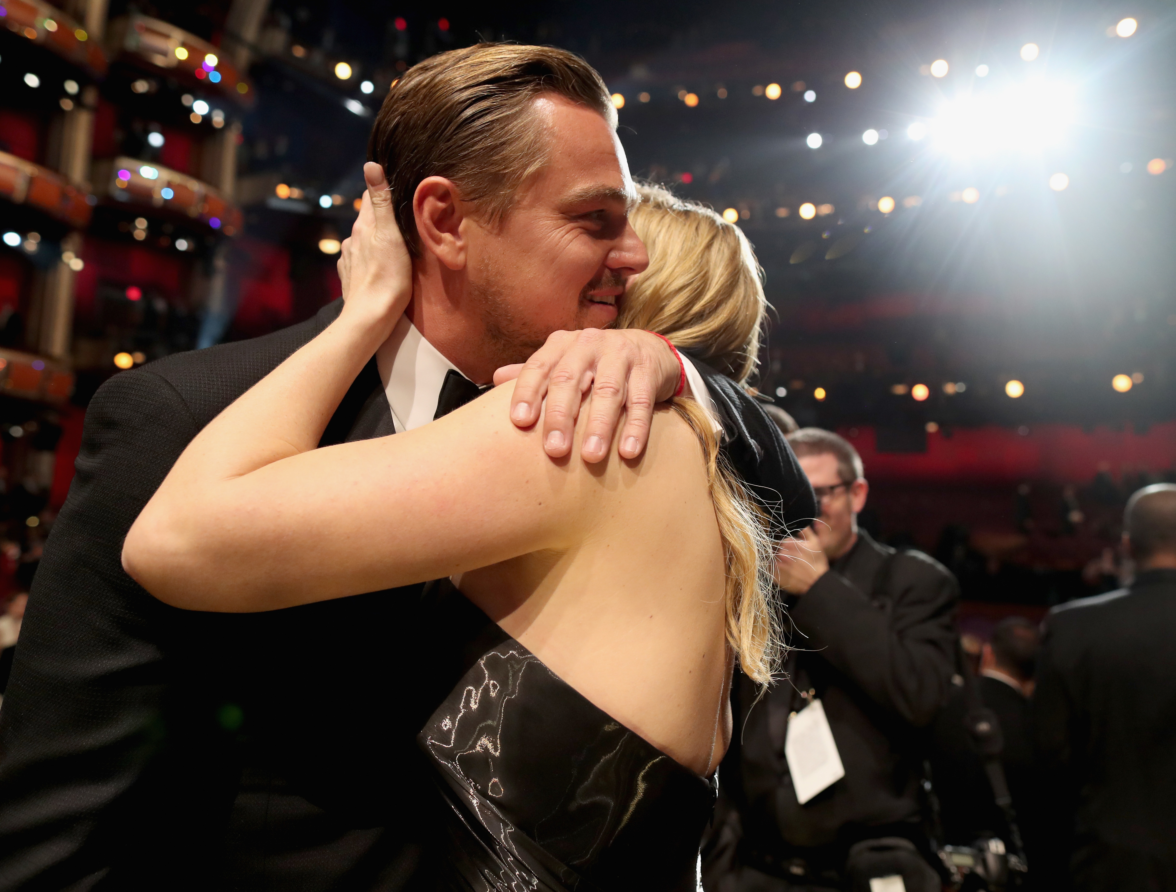 Kate and Leo embracing at an event