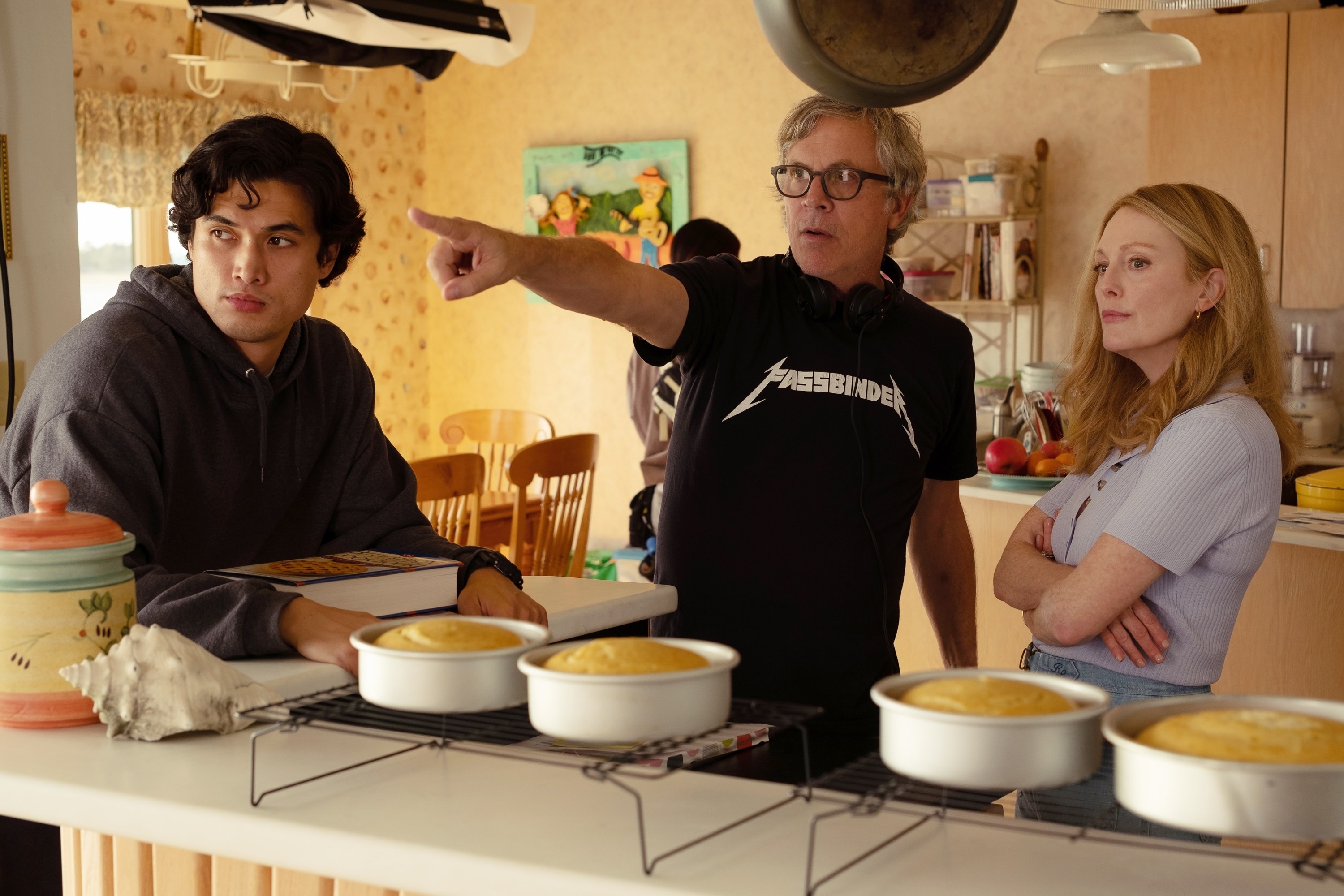 Todd Haynes working with Charles Melton and Julianne Moore on set of &quot;May December&quot;