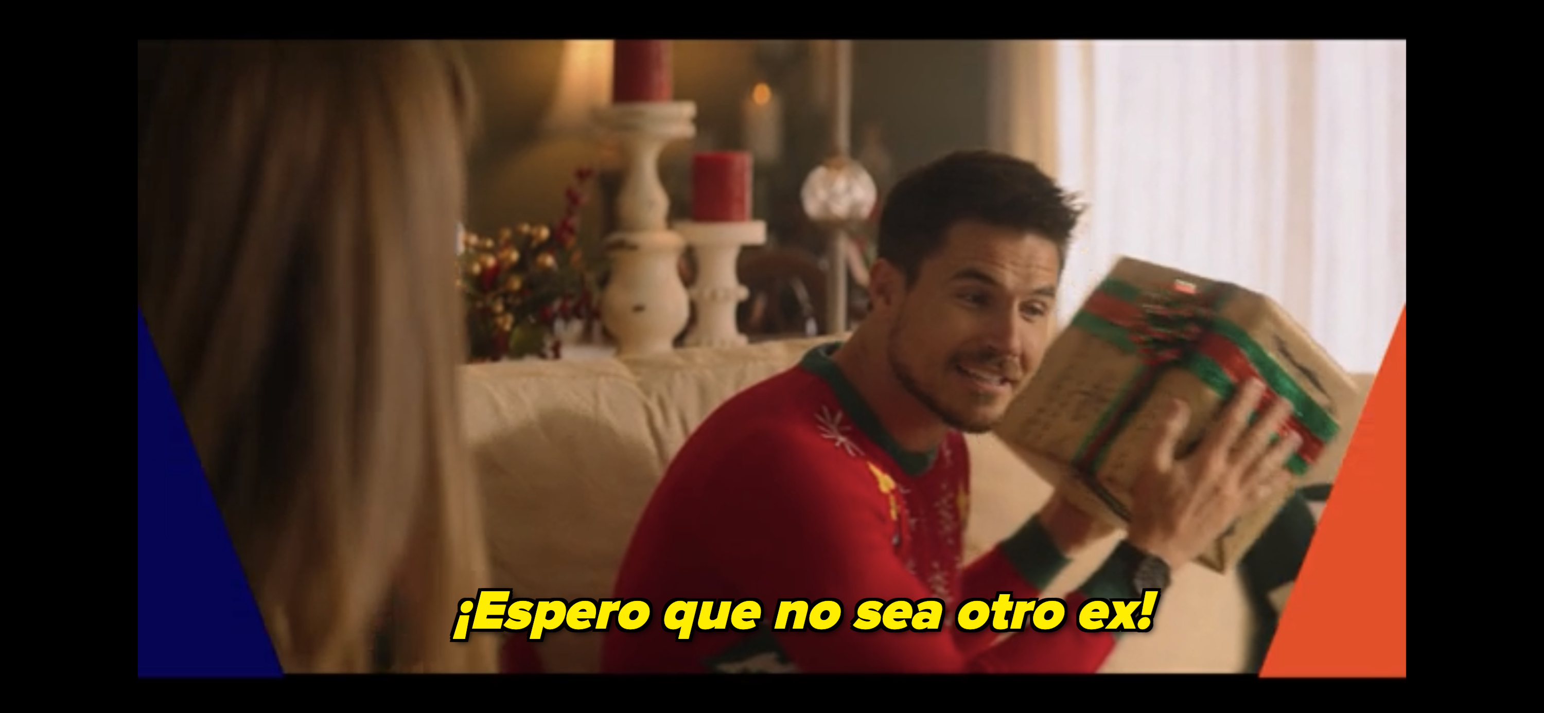 Graham shaking a present and saying, 'Hope it's not another ex!"