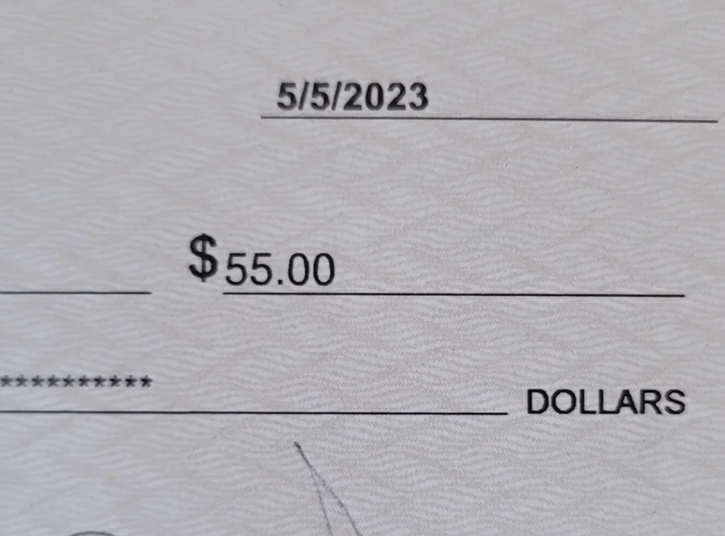 A check for "$55.00"